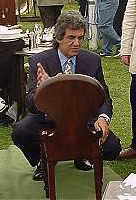 david dickinson on the chair